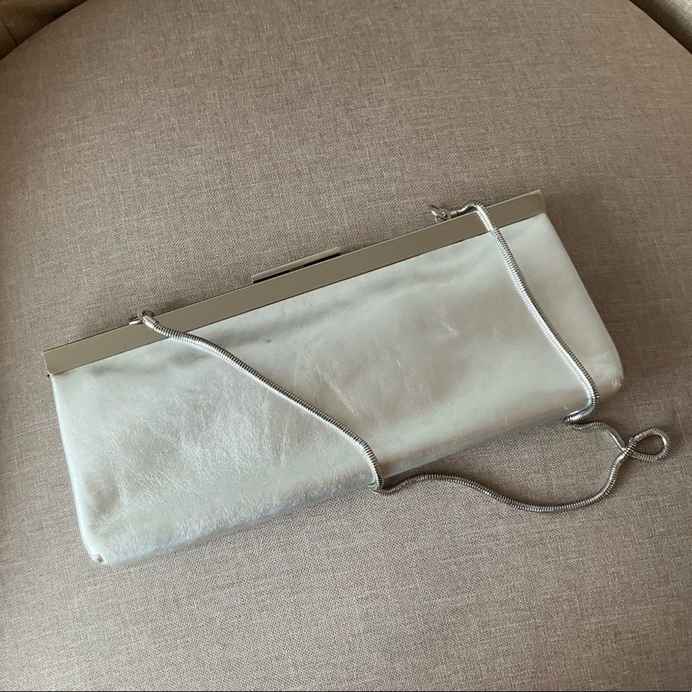 Calvin Klein silver metallic leather long clutch, rope chain